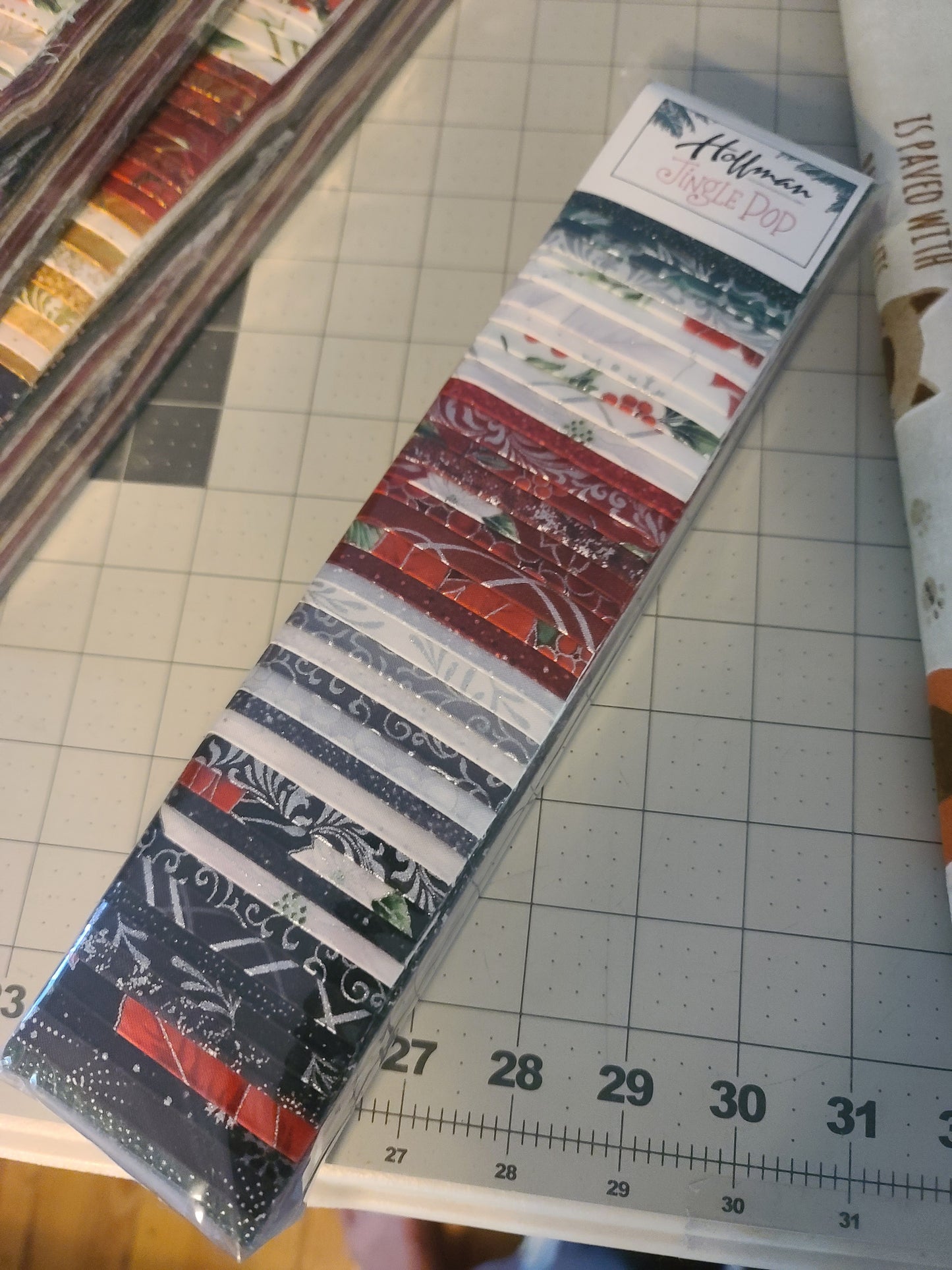 Pk/40 Pre-cut fabric strips 2 1/2" "Jingle Pops" Assorted Christmas prints 100% Cotton. SILVER or GOLD metallic print
