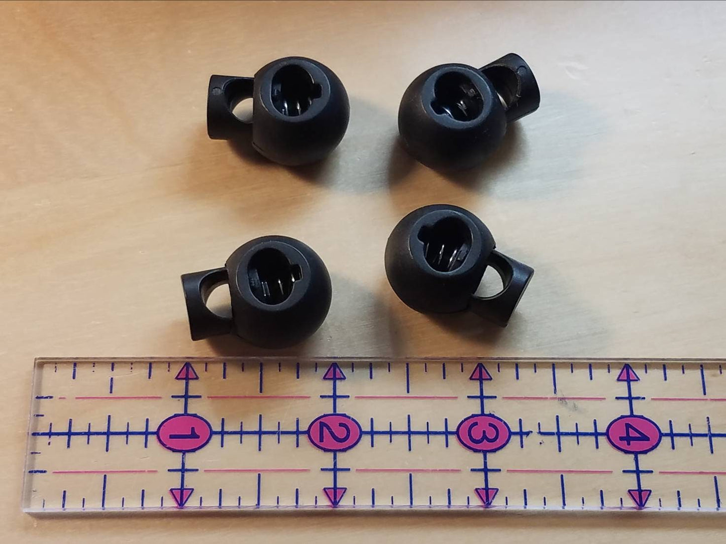 Cord adjuster 'cinch' clamps, round style, pk/4, black. Secure mask straps for better fit. Replacement clamps